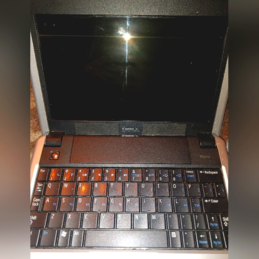 Mini dell laptop with portals for phones computers ETC.